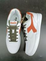 Sportschuhe Sneakers Diadora RAPTOR LOW CAMPUS Mann WEISS/ARABESCO ORANGE